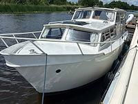 (externe locatie heerenveen ) motorkruiser ca. 9m met inboord diesel en yamaha 9,9pk