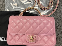 Faillissementsveiling: exclusieve design kleding, schoenen, tassen en accessoires