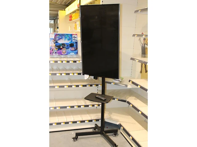 Flatscreen tv lg 43lf630v op verrijdbare standaard met afstandsbediening. voedingskabel ontbreekt (standaard) - afbeelding 2 van  3