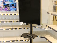 Flatscreen tv lg 43lf630v op verrijdbare standaard met afstandsbediening. voedingskabel ontbreekt (standaard) - afbeelding 2 van  3