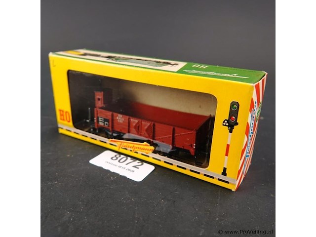 Fleischmann hogeboordwagen) met remmershuisje, uitgevoerd in de roodbruine kleurstelling van de duitse spoorwegen (db) modelnr: 1485 - afbeelding 1 van  3