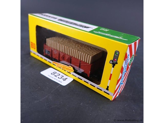 Fleischmann open goederenwagon beladen met een lading rond houten grubenholz (stuthout) - afbeelding 1 van  3