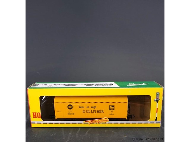 Fleischmann spoorkoelwagon, uitgevoerd in de huisstijl van de zweedse spoorwegen (sj) met reclame voor het isolatiemateriaalmerk gullfiber modelnr: 1467g - afbeelding 2 van  3