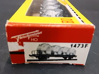 Fleischmann wagon met container-/tankbakken met de tekst "von haus zu haus" van de duitse spoorwegen (db) - afbeelding 3 van  3