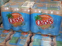 Fruitdrank oasis tropical. 64 trays a 24 stuks 33 cl. totaal 1536 blikken. tht 12-25. bod is inclusief 230,... - afbeelding 3 van  3