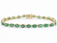 Geelgouden tennisarmband diamant smaragd