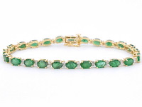 Geelgouden tennisarmband met diamanten en smaragden - afbeelding 1 van  9