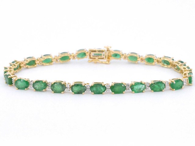Geelgouden tennisarmband met diamanten en smaragden - afbeelding 1 van  7