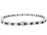 Gouden 18 karaat tennisarmband met natuurlijke diamanten en robijnen - afbeelding 1 van  3