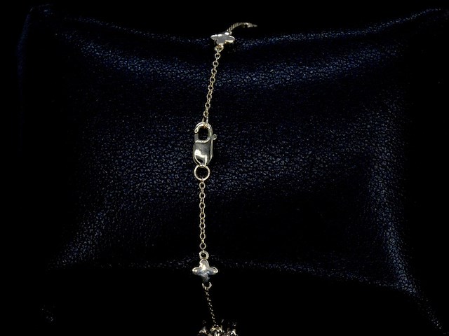 Gouden armband in klaver vier vorm met diamanten - afbeelding 8 van  10