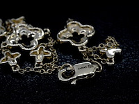 Gouden armband in klaver vier vorm met diamanten - afbeelding 9 van  10