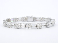 Gouden armband met briljant en baguette geslepen diamanten