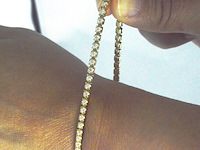 Gouden armband met briljant geslepen diamanten en een onzichtbare sluiting - afbeelding 11 van  11