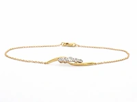 Gouden armband met diamanten in een rij gezet