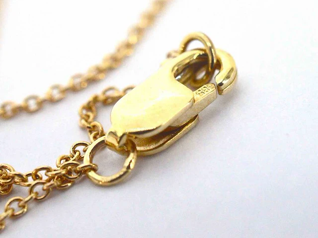 Gouden armband met diamanten in een rij gezet - afbeelding 9 van  11