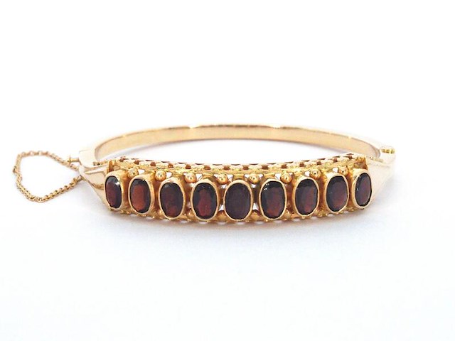 Gouden armband met rode edelstenen - afbeelding 1 van  2