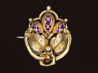 Gouden broche met amethist