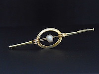 Gouden broche met orient parel