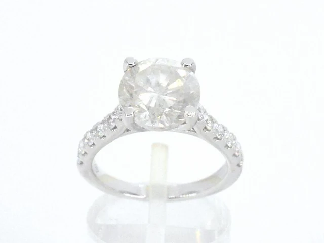 Gouden diamanten solitair ring met een grote diamant van 4.00 carat en kleine diamanten - afbeelding 1 van  7