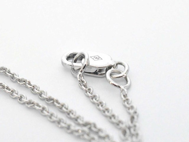 Gouden druppelvormige hanger en collier vol met diamanten - afbeelding 10 van  10