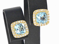 Gouden entourage oorbellen met topazen en diamanten