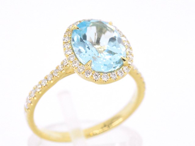 Gouden entourage ring met ovaal geslepen topaas - afbeelding 6 van  11