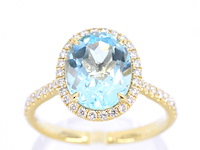 Gouden entourage ring met ovaal geslepen topaas - afbeelding 1 van  11