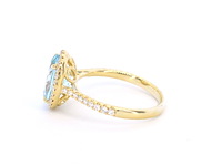 Gouden entourage ring met ovaal geslepen topaas - afbeelding 7 van  11