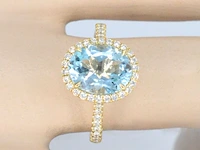 Gouden entourage ring met ovaal geslepen topaas - afbeelding 4 van  11