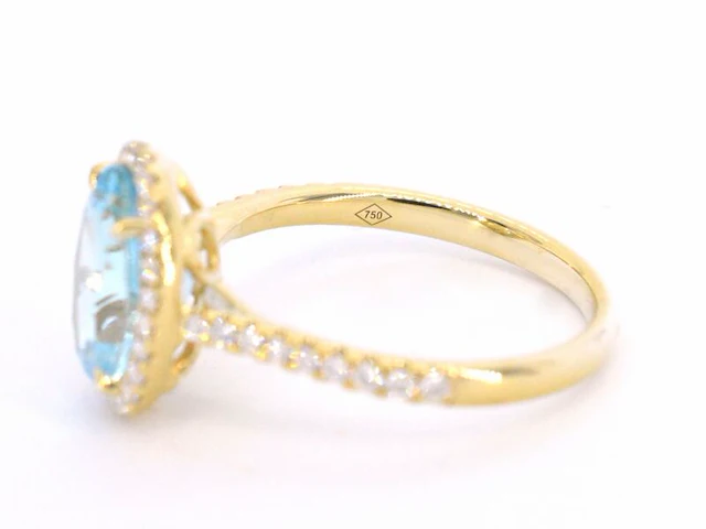 Gouden entourage ring met ovaal geslepen topaas - afbeelding 11 van  11