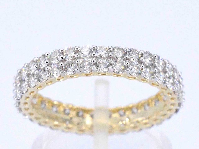 Gouden eternity ring met diamanten - afbeelding 1 van  10