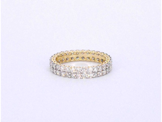 Gouden eternity ring met diamanten - afbeelding 7 van  10