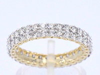Gouden eternity ring met diamanten - afbeelding 1 van  11