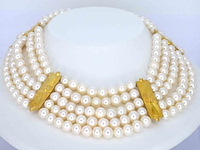 Gouden halscollier met rijen van parels en gouden motief schakels - afbeelding 1 van  6