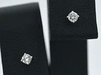 Gouden oorbellen met diamant