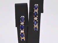 Gouden oorbellen met diamanten en saffier