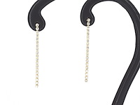 Gouden oorhangers met een rij aan natuurlijke diamanten