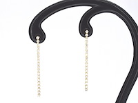 Gouden oorhangers met een rij aan natuurlijke diamanten - afbeelding 5 van  9