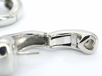 Gouden piaget hart oorbellen met topaas - afbeelding 2 van  12