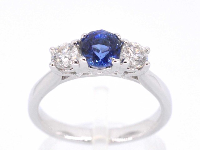 Gouden ring met diamant en een blauwe saffier - afbeelding 1 van  10