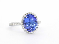 Gouden ring met diamant en tanzaniet - afbeelding 2 van  10