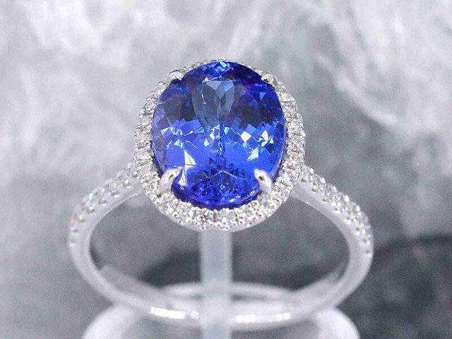 Gouden ring met diamant en tanzaniet - afbeelding 1 van  10