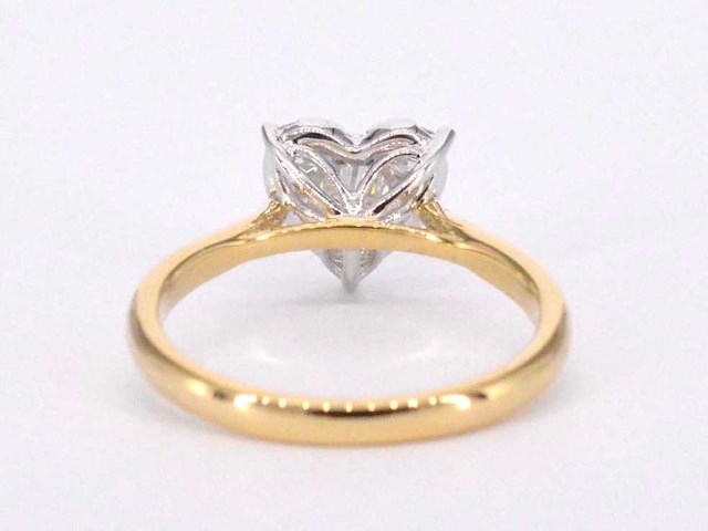 Gouden ring met diamanten in hart vorm - afbeelding 10 van  10