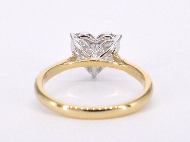 Gouden ring met diamanten in hart vorm - afbeelding 9 van  11