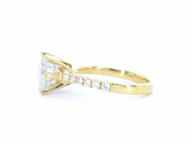 Gouden ring met een natuurlijke diamant - afbeelding 7 van  11