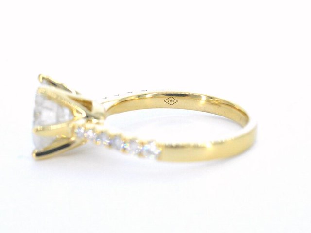 Gouden ring met een natuurlijke diamant - afbeelding 11 van  11