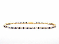 Gouden tennis armband met diamanten en saffieren - afbeelding 1 van  9
