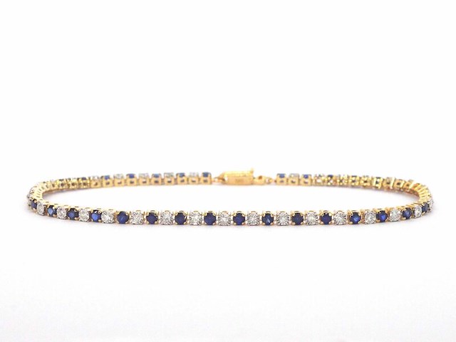 Gouden tennis armband met diamanten en saffieren - afbeelding 1 van  10