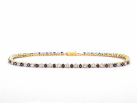 Gouden tennis armband met diamanten en saffieren - afbeelding 1 van  10