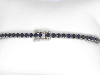 Gouden tennisarmband met 7.00ct aan blauwe saffieren - afbeelding 3 van  4